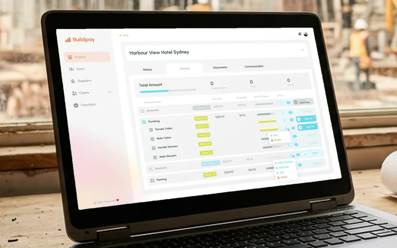 Buildpay project payments screen on a laptop at a construction site